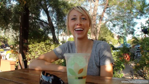 Blonde Amateur Styles Her Hair in Shorts Outdoors – photo 2 of 16