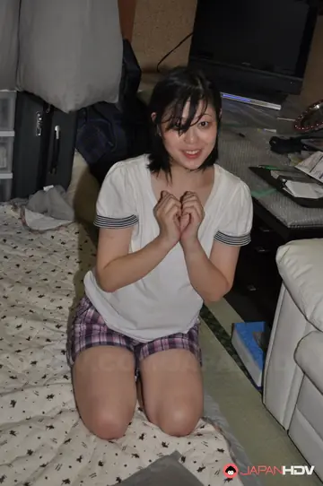 Asian Babe with Short Hair Gives a Handjob and Spreads Her Hairy Bush