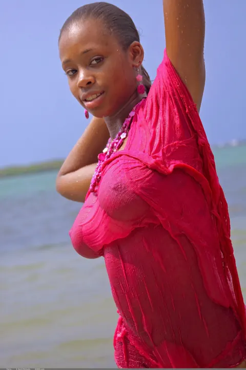 Woman Strips Nude and Poses with Arched Back – photo 2 of 20