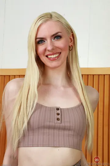 Petite Blonde Amateur Undresses and Poses Nude