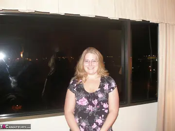 Chubby Woman with Big Tits Has Group Sex in a Hotel Bedroom