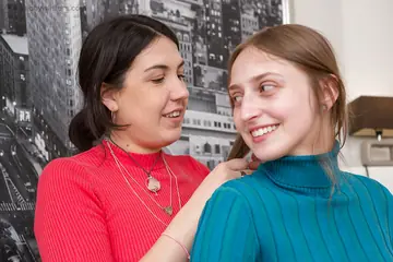 Busty Lesbians in Stockings Lick and Finger Hairy Pussies