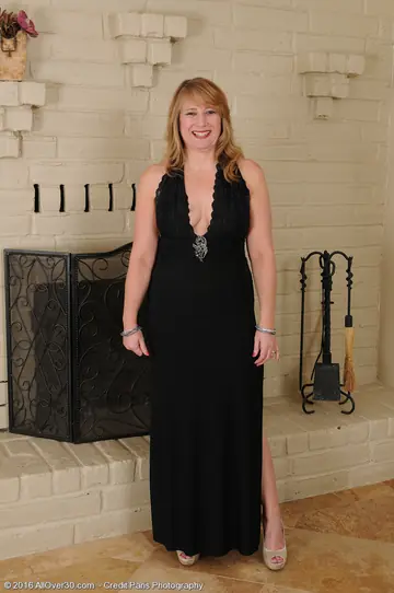 Mature Redhead BBW Undresses by the Fireplace and Spreads Her Pussy
