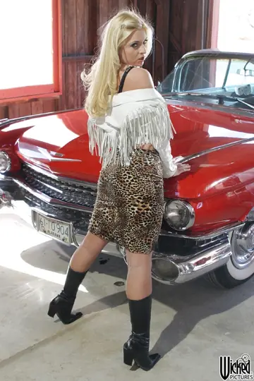 Dutch Blonde Strips Out of Her Skirt in the Garage