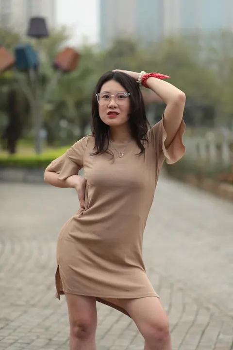 Asian Brunette Flashes Her Body in a Dress Outdoors – photo 10 of 21