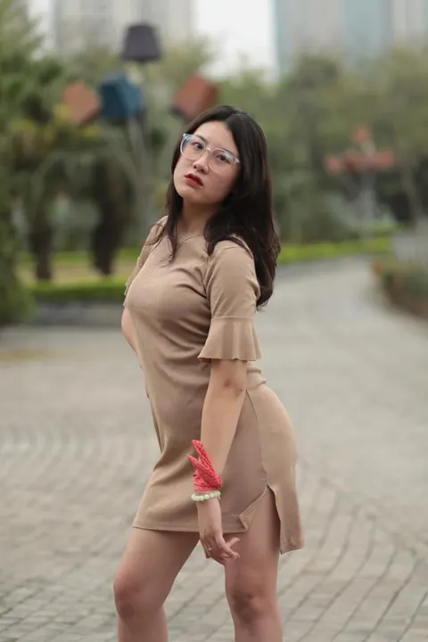 Asian Brunette Flashes Her Body in a Dress Outdoors – photo 8 of 21