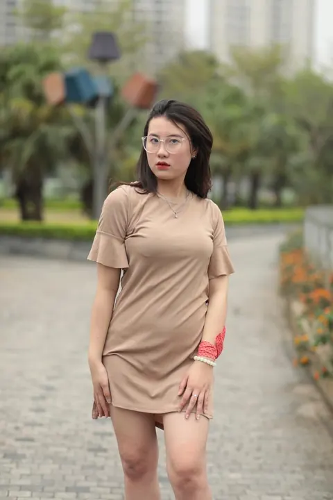 Asian Brunette Flashes Her Body in a Dress Outdoors – photo 19 of 21