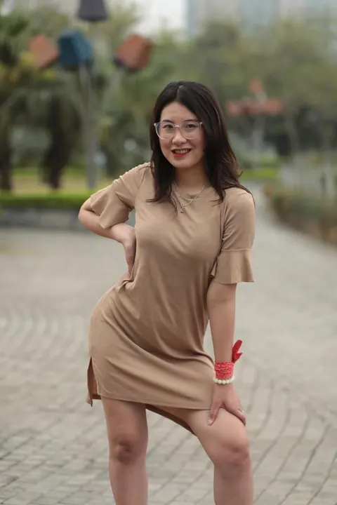 Asian Brunette Flashes Her Body in a Dress Outdoors – photo 12 of 21