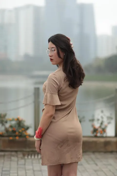 Asian Brunette Flashes Her Body in a Dress Outdoors – photo 1 of 21