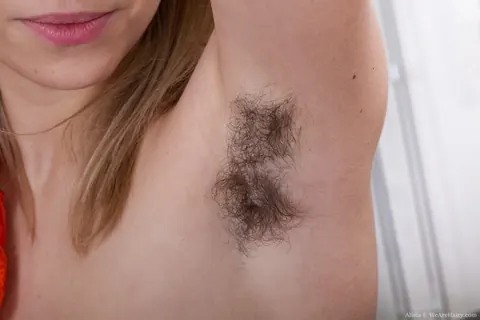 Busty Woman Strips and Spreads Her Hairy Pussy – photo 6 of 16