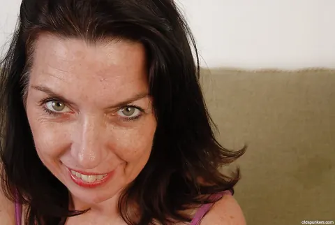 Mature Busty Brunette Pulls Aside Her Panties to Finger Her Hairy Pussy – photo 1 of 16