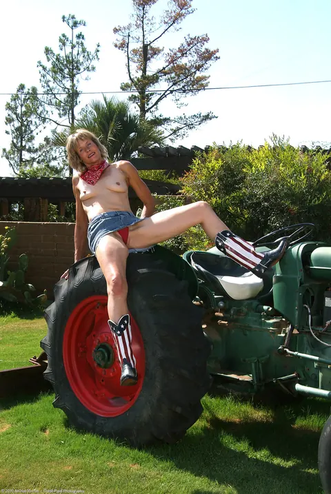 Short-Haired MILF Strips Out of Her Bikini on a Tractor – photo 7 of 21