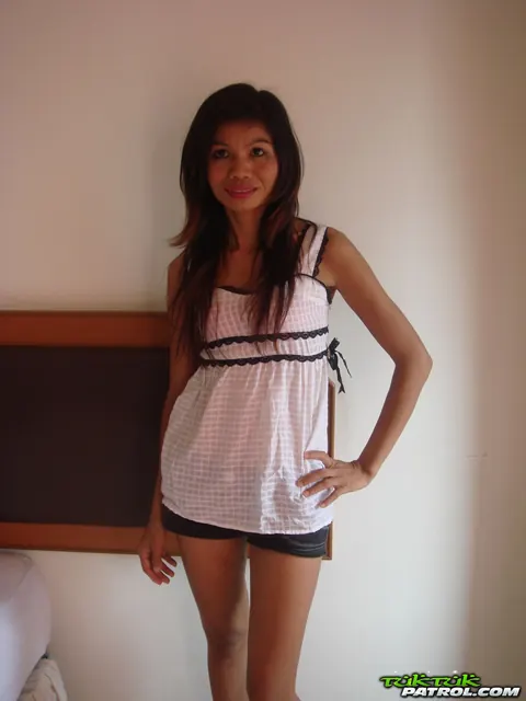 Petite Asian MILF Strips Nude and Spreads in the Bedroom – photo 3 of 21