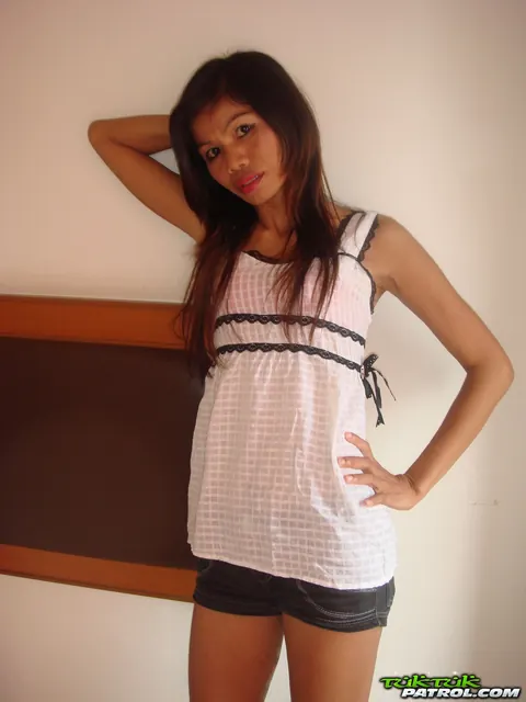 Petite Asian MILF Strips Nude and Spreads in the Bedroom – photo 5 of 21