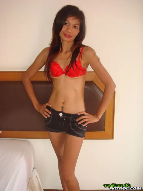 Petite Asian MILF Strips Nude and Spreads in the Bedroom – photo 9 of 21