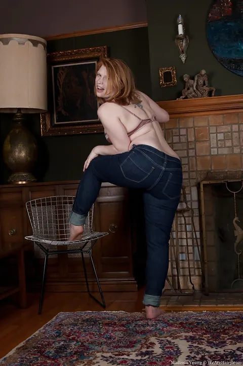 BBW Redhead in Lingerie Pulls Down Her Jeans and Fingers Her Pussy – photo 4 of 16