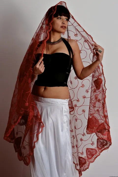 Indian Brunette Lifts Her Skirt and Poses Nude in Boots – photo 6 of 15