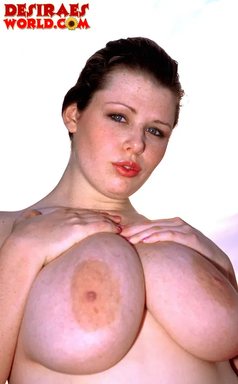 Desirae: Busty Brunette MILF Bares All and Spreads Her Legs on the Beach – photo 12 of 21
