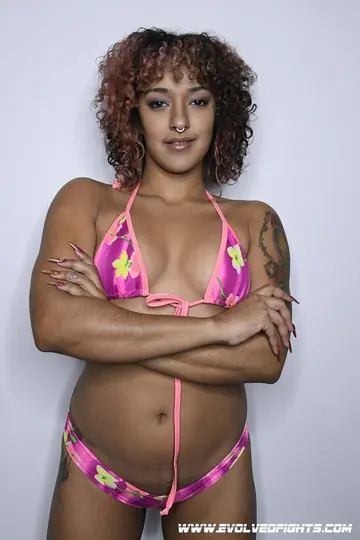 Tall Ebony Redhead in a Bikini and Costume Wrestles and Sucks Cock in the Gym