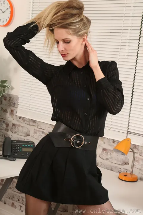 Rebecca Leah: Tall British Blonde Poses in Uniform and Pantyhose at the Office – photo 1 of 21