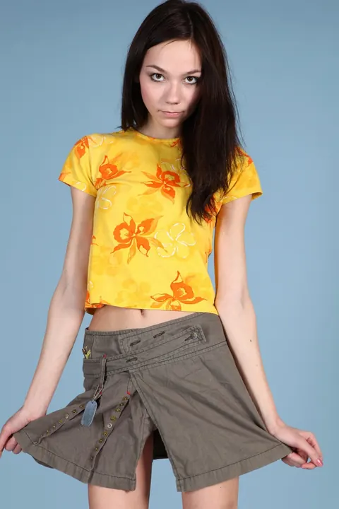 Mimi Yuliya: Tall Slim Brunette in a Skirt Flashes Her Shaved Pussy and Small Tits – photo 2 of 21