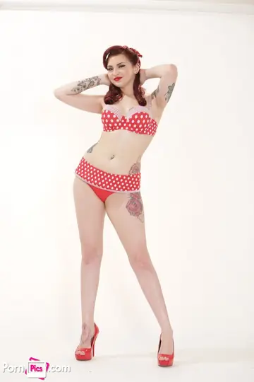 Redhead with Big Natural Tits Strips Off Her Lingerie and Shows Her Tattoos