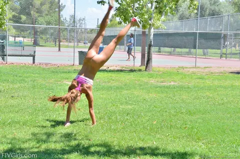 Marry Lynn: Petite Brunette in Shorts Spreads Her Pussy in the Park – photo 9 of 20