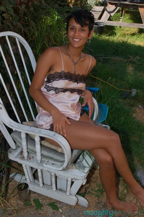 Ebony Woman with Short Hair Shows Hairy Armpits and Bush Outdoors – photo 1 of 21