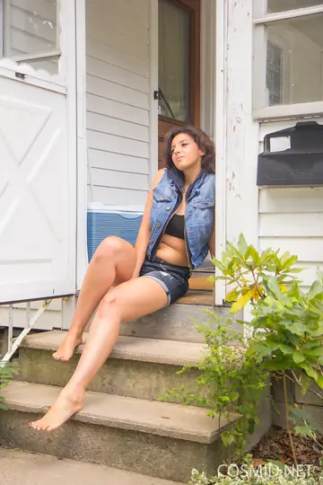 Brunette in Shorts Reveals Her Big Tits and Shows Her Ass Outdoors