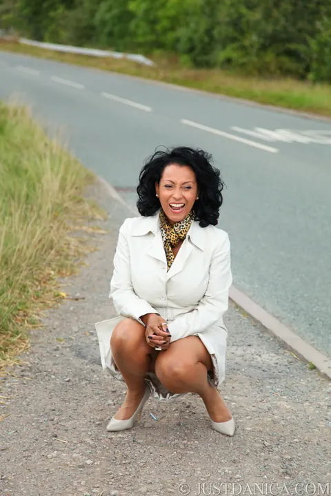 Danica Collins: Ebony MILF with Big Tits Shows Off Her Stockings and Heels Outdoors – photo 5 of 20