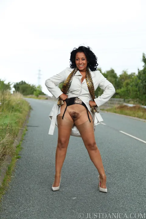 Danica Collins: Ebony MILF with Big Tits Shows Off Her Stockings and Heels Outdoors – photo 9 of 20