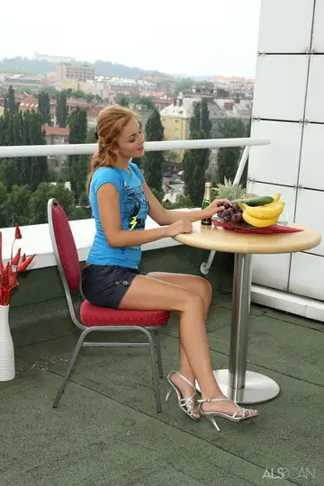 European Brunette Masturbates with a Cucumber on a Rooftop Patio