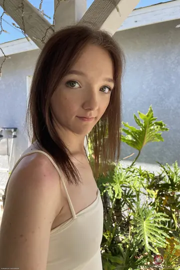 Woman Strips Nude and Poses Standing
