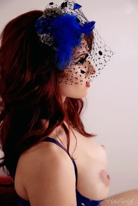 Andrea Rosu: Busty Redhead MILF Strips Out of Blue Latex and Spreads – photo 10 of 21