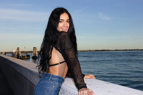 Dulce Rivera: Petite Latina Teases in a Lace Bra and Jeans Outdoors – photo 6 of 20