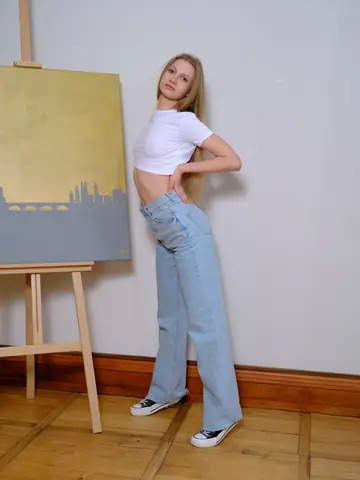 Woman Undresses and Poses Front and Back for Glamour Set