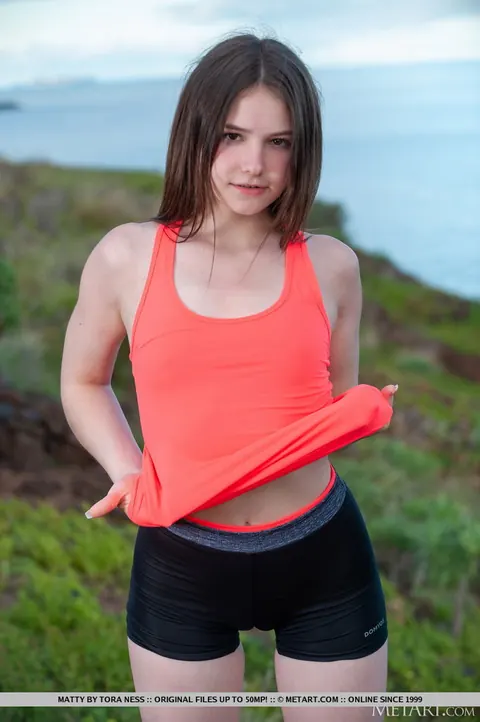 Matty Mila: Brunette Bares Her Natural Tits and Strips Naked on a Seaside Cliff – photo 3 of 18