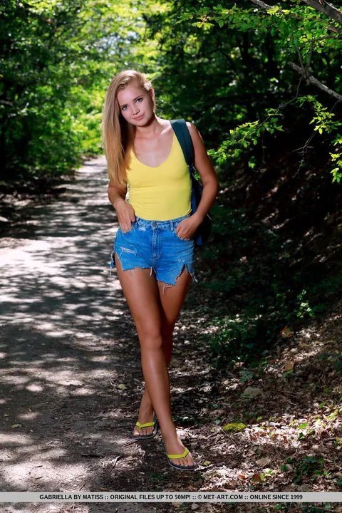 Petite Blonde Strips Out of Her Shorts in the Woods – photo 2 of 18