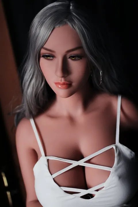 Woman with Enhanced Tits Peels Off Her Top and Poses Nude – photo 13 of 21