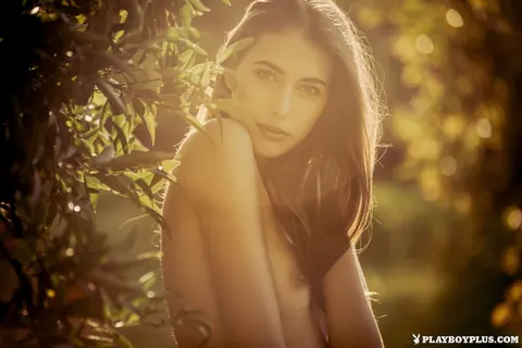 Katrine Pirs: Brunette Undresses Beside an Orange Tree – photo 1 of 12