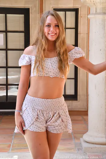 Tall Blonde Strips Out of Her Shorts and Spreads on the Balcony