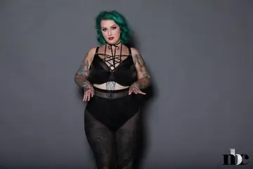 BBW in Pantyhose Reveals Her Tattoos and Big Tits