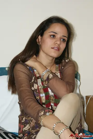 Indian Brunette Strips Out of Her Lingerie in the Bedroom