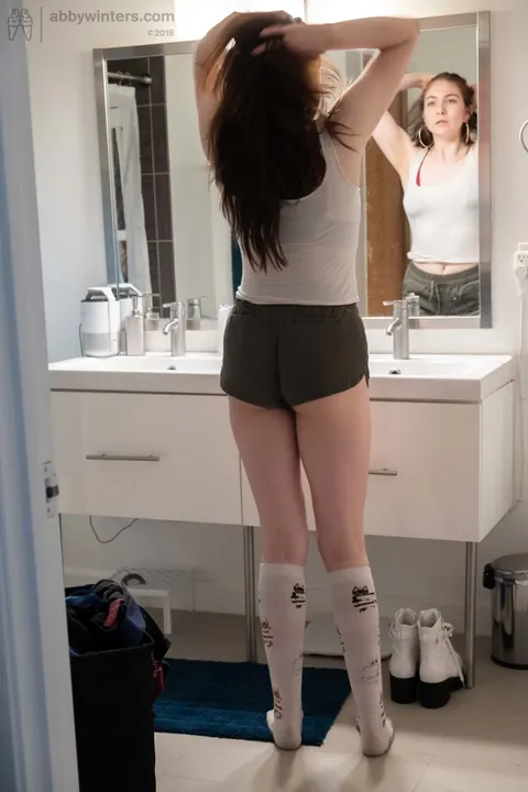 Brunette Strips Out of Her Shorts and Lingerie – photo 18 of 21