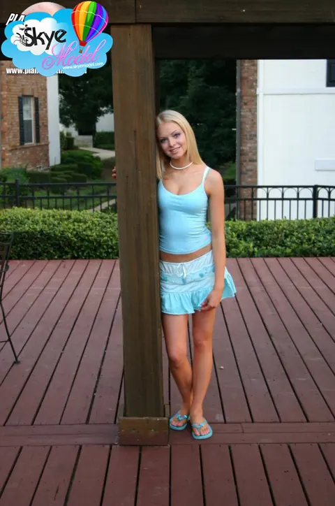 Skye Model: Blonde Amateur Flashes Her Butt Cheek in a Skirt Outdoors – photo 2 of 12