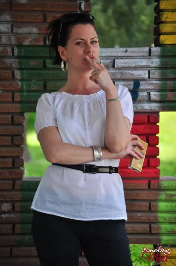 Brunette MILF Smokes in Yoga Pants