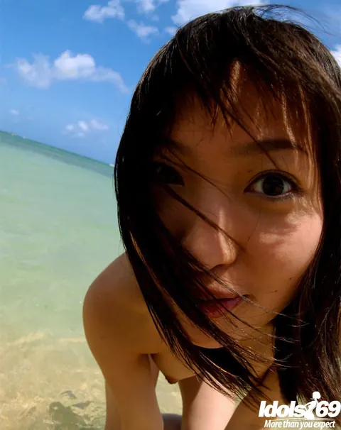 Japanese Babe Strips Nude and Shows Her Hairy Pussy on the Beach – photo 9 of 16