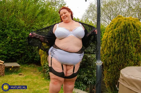 Curvy Redhead MILF Masturbates with a Dildo Outdoors – photo 3 of 10