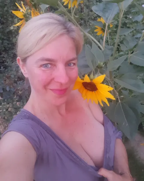 Busty Blonde MILF with Short Hair Poses in a Skirt Outdoors – photo 16 of 20