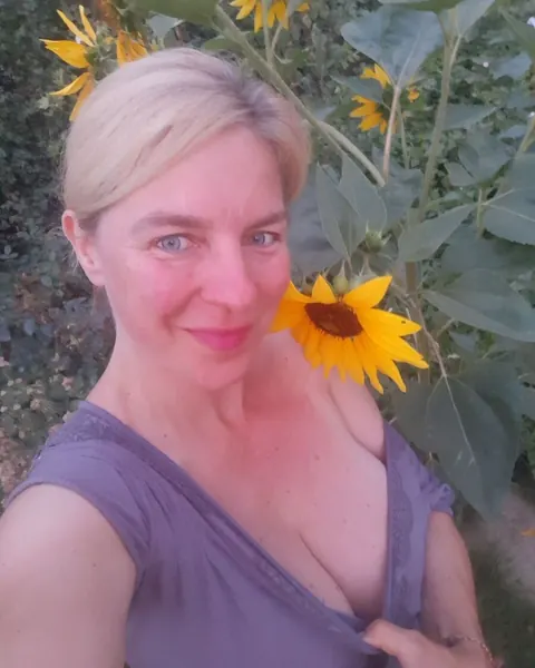Busty Blonde MILF with Short Hair Poses in a Skirt Outdoors – photo 8 of 20